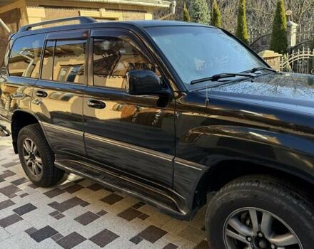 Черный Лексус ЛХ, объемом двигателя 4.66 л и пробегом 292 тыс. км за 12800 $, фото 3 на Automoto.ua