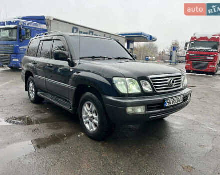 Черный Лексус ЛХ, объемом двигателя 4.6 л и пробегом 300 тыс. км за 13777 $, фото 2 на Automoto.ua