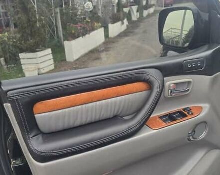 Черный Лексус ЛХ, объемом двигателя 4.7 л и пробегом 370 тыс. км за 14800 $, фото 1 на Automoto.ua