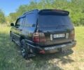 Черный Лексус ЛХ, объемом двигателя 4.66 л и пробегом 400 тыс. км за 14000 $, фото 4 на Automoto.ua