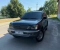 Черный Лексус ЛХ, объемом двигателя 4.67 л и пробегом 305 тыс. км за 15800 $, фото 1 на Automoto.ua