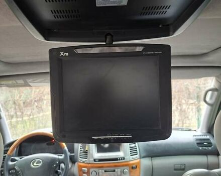 Черный Лексус ЛХ, объемом двигателя 4.66 л и пробегом 300 тыс. км за 12000 $, фото 5 на Automoto.ua