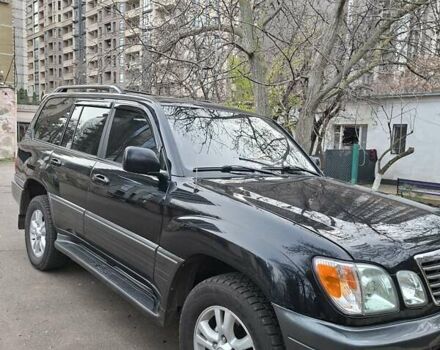 Черный Лексус ЛХ, объемом двигателя 4.66 л и пробегом 300 тыс. км за 12000 $, фото 1 на Automoto.ua