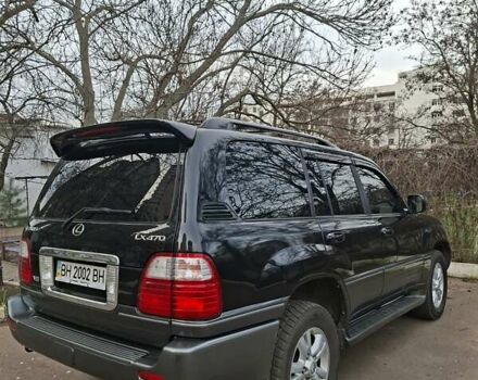 Черный Лексус ЛХ, объемом двигателя 4.66 л и пробегом 300 тыс. км за 12000 $, фото 2 на Automoto.ua