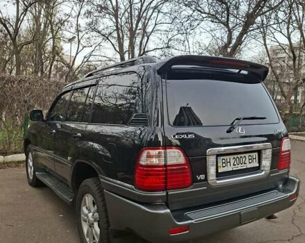 Черный Лексус ЛХ, объемом двигателя 4.66 л и пробегом 300 тыс. км за 12000 $, фото 4 на Automoto.ua