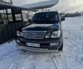 Черный Лексус ЛХ, объемом двигателя 4.7 л и пробегом 297 тыс. км за 14800 $, фото 1 на Automoto.ua