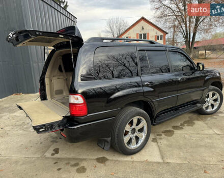 Черный Лексус ЛХ, объемом двигателя 4.7 л и пробегом 300 тыс. км за 14900 $, фото 9 на Automoto.ua