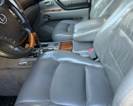 Черный Лексус ЛХ, объемом двигателя 4.66 л и пробегом 292 тыс. км за 12800 $, фото 4 на Automoto.ua