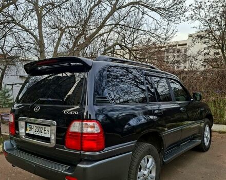 Черный Лексус ЛХ, объемом двигателя 4.7 л и пробегом 300 тыс. км за 12000 $, фото 2 на Automoto.ua