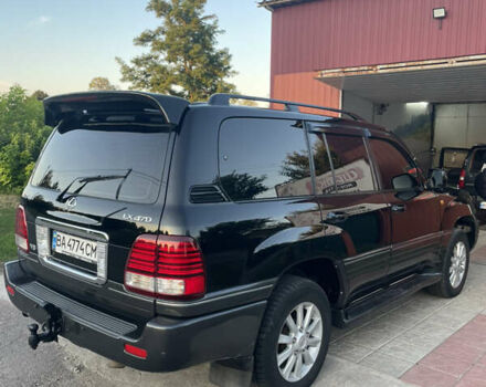 Черный Лексус ЛХ, объемом двигателя 4.66 л и пробегом 460 тыс. км за 12500 $, фото 4 на Automoto.ua