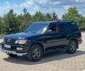 Чорний Лексус ЛХ, об'ємом двигуна 4.66 л та пробігом 410 тис. км за 16000 $, фото 1 на Automoto.ua