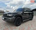 Черный Лексус ЛХ, объемом двигателя 4.7 л и пробегом 256 тыс. км за 14500 $, фото 1 на Automoto.ua