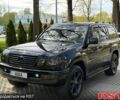 Черный Лексус ЛХ, объемом двигателя 4.7 л и пробегом 350 тыс. км за 11000 $, фото 1 на Automoto.ua
