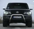 Чорний Лексус ЛХ, об'ємом двигуна 4.7 л та пробігом 258 тис. км за 16500 $, фото 1 на Automoto.ua