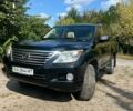 Черный Лексус ЛХ, объемом двигателя 5.66 л и пробегом 355 тыс. км за 16000 $, фото 1 на Automoto.ua