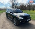Черный Лексус ЛХ, объемом двигателя 5.66 л и пробегом 280 тыс. км за 23000 $, фото 1 на Automoto.ua
