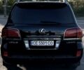 Черный Лексус ЛХ, объемом двигателя 5.66 л и пробегом 380 тыс. км за 26500 $, фото 2 на Automoto.ua