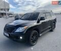 Черный Лексус ЛХ, объемом двигателя 5.66 л и пробегом 215 тыс. км за 25000 $, фото 1 на Automoto.ua