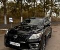 Черный Лексус ЛХ, объемом двигателя 5.7 л и пробегом 198 тыс. км за 22500 $, фото 1 на Automoto.ua