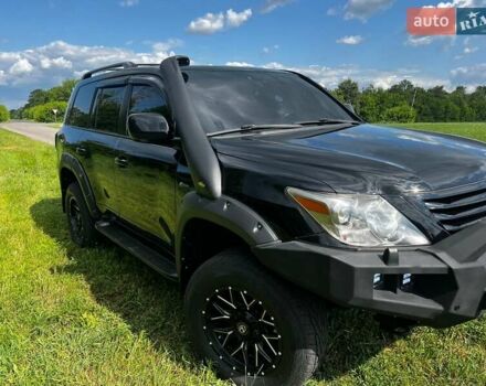 Черный Лексус ЛХ, объемом двигателя 5.66 л и пробегом 234 тыс. км за 34999 $, фото 1 на Automoto.ua