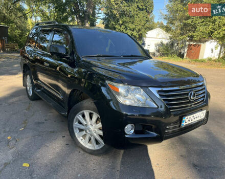 Черный Лексус ЛХ, объемом двигателя 5.66 л и пробегом 197 тыс. км за 24950 $, фото 1 на Automoto.ua