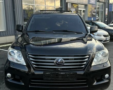 Черный Лексус ЛХ, объемом двигателя 5.7 л и пробегом 306 тыс. км за 21500 $, фото 1 на Automoto.ua