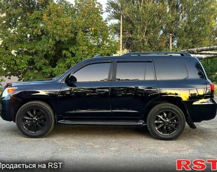 Черный Лексус ЛХ, объемом двигателя 5.7 л и пробегом 242 тыс. км за 20500 $, фото 3 на Automoto.ua