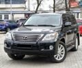 Черный Лексус ЛХ, объемом двигателя 5.66 л и пробегом 260 тыс. км за 26400 $, фото 1 на Automoto.ua