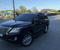 Черный Лексус ЛХ, объемом двигателя 5.66 л и пробегом 380 тыс. км за 26500 $, фото 1 на Automoto.ua