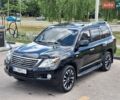 Черный Лексус ЛХ, объемом двигателя 5.66 л и пробегом 267 тыс. км за 22100 $, фото 1 на Automoto.ua