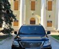 Черный Лексус ЛХ, объемом двигателя 5.7 л и пробегом 253 тыс. км за 26000 $, фото 1 на Automoto.ua