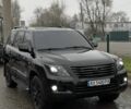 Черный Лексус ЛХ, объемом двигателя 5.7 л и пробегом 200 тыс. км за 21500 $, фото 1 на Automoto.ua