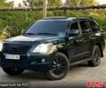 Черный Лексус ЛХ, объемом двигателя 5.7 л и пробегом 242 тыс. км за 20500 $, фото 1 на Automoto.ua
