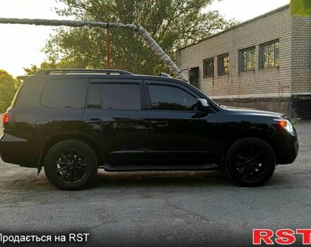 Черный Лексус ЛХ, объемом двигателя 5.7 л и пробегом 242 тыс. км за 20500 $, фото 2 на Automoto.ua