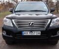Черный Лексус ЛХ, объемом двигателя 5.66 л и пробегом 237 тыс. км за 31000 $, фото 1 на Automoto.ua