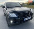 Черный Лексус ЛХ, объемом двигателя 5.66 л и пробегом 215 тыс. км за 25000 $, фото 1 на Automoto.ua