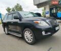 Черный Лексус ЛХ, объемом двигателя 5.66 л и пробегом 391 тыс. км за 17500 $, фото 1 на Automoto.ua