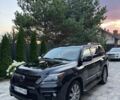 Черный Лексус ЛХ, объемом двигателя 5.66 л и пробегом 275 тыс. км за 25000 $, фото 1 на Automoto.ua