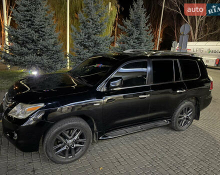 Черный Лексус ЛХ, объемом двигателя 5.7 л и пробегом 267 тыс. км за 23800 $, фото 1 на Automoto.ua