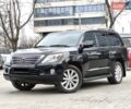 Черный Лексус ЛХ, объемом двигателя 5.66 л и пробегом 260 тыс. км за 26400 $, фото 1 на Automoto.ua