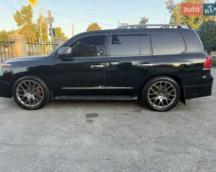 Черный Лексус ЛХ, объемом двигателя 5.66 л и пробегом 317 тыс. км за 23200 $, фото 3 на Automoto.ua