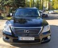 Чорний Лексус ЛХ, об'ємом двигуна 5.7 л та пробігом 210 тис. км за 516 $, фото 1 на Automoto.ua