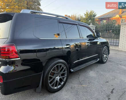 Черный Лексус ЛХ, объемом двигателя 5.66 л и пробегом 317 тыс. км за 23200 $, фото 4 на Automoto.ua