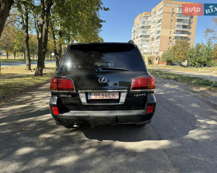 Черный Лексус ЛХ, объемом двигателя 5.66 л и пробегом 278 тыс. км за 23500 $, фото 1 на Automoto.ua