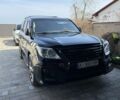 Черный Лексус ЛХ, объемом двигателя 5.7 л и пробегом 325 тыс. км за 22000 $, фото 1 на Automoto.ua