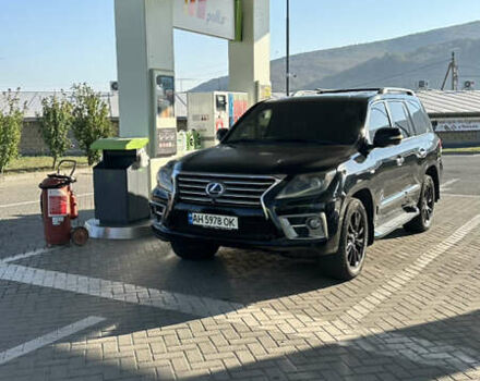 Черный Лексус ЛХ, объемом двигателя 5.66 л и пробегом 320 тыс. км за 33000 $, фото 2 на Automoto.ua