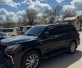Черный Лексус ЛХ, объемом двигателя 5.7 л и пробегом 380 тыс. км за 33000 $, фото 1 на Automoto.ua
