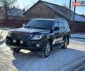 Черный Лексус ЛХ, объемом двигателя 5.7 л и пробегом 193 тыс. км за 29500 $, фото 1 на Automoto.ua