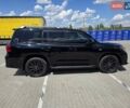 Черный Лексус ЛХ, объемом двигателя 5.66 л и пробегом 295 тыс. км за 27777 $, фото 2 на Automoto.ua