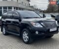 Черный Лексус ЛХ, объемом двигателя 5.66 л и пробегом 310 тыс. км за 25500 $, фото 1 на Automoto.ua